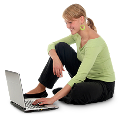 A woman on the floor using laptop